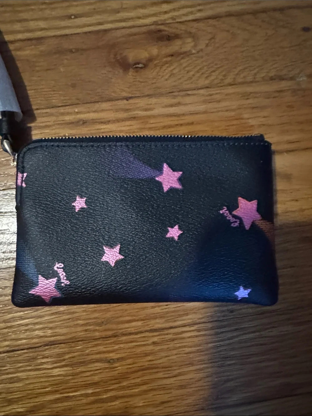 COACH Black Leather wristlet with Pink Star Accents